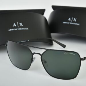 Elegant close-up of stylish sunglasses with sleek packaging, perfect for fashion shoots.